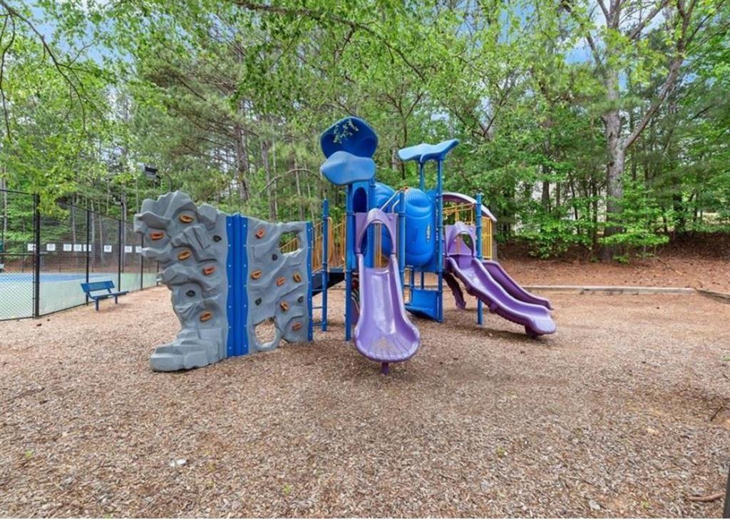 4282 Goldfield Trace, Unit MAIN & 2 Suwanee, GA 30024 - Photo 28 of 28 a view of outdoor space with entertaining space