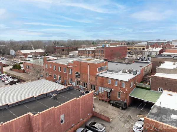 a view of a city with tall buildings
