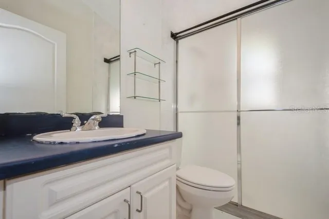 an empty room with fan