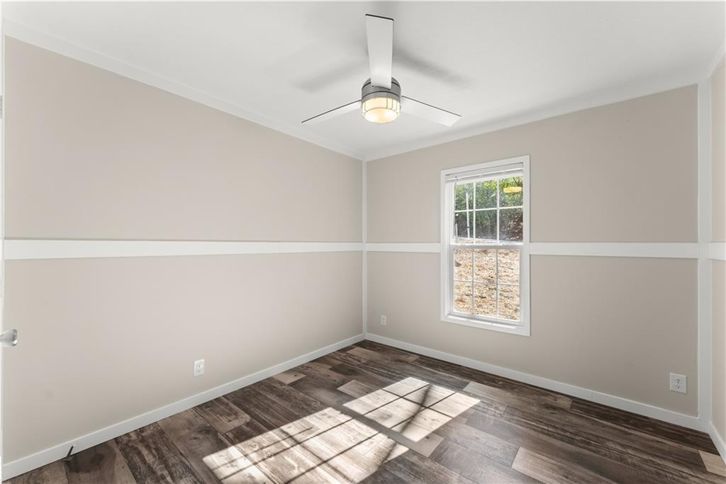 2410 Bolman Road Gainesville, GA 30507 - Photo 13 of 32 an empty room with windows
