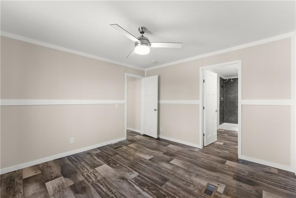 2410 Bolman Road Gainesville, GA 30507 - Photo 20 of 32 wooden floor in an empty room