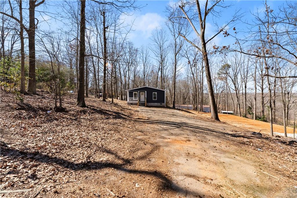 2410 Bolman Road Gainesville, GA 30507 - Photo 22 of 32 a view of a backyard of the house