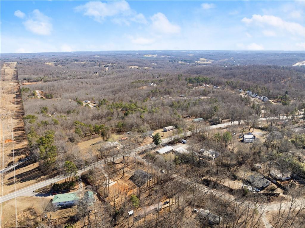 2410 Bolman Road Gainesville, GA 30507 - Photo 32 of 32 an aerial view of house with yard and mountain view in back