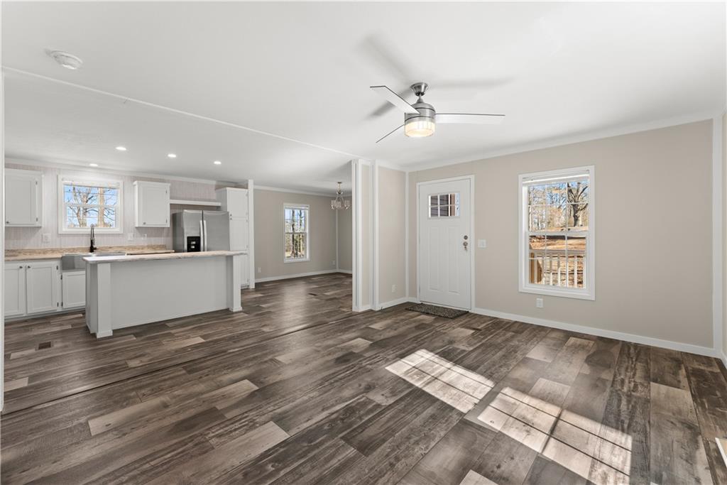2410 Bolman Road Gainesville, GA 30507 - Photo 5 of 32 a view of kitchen with wooden floor and window
