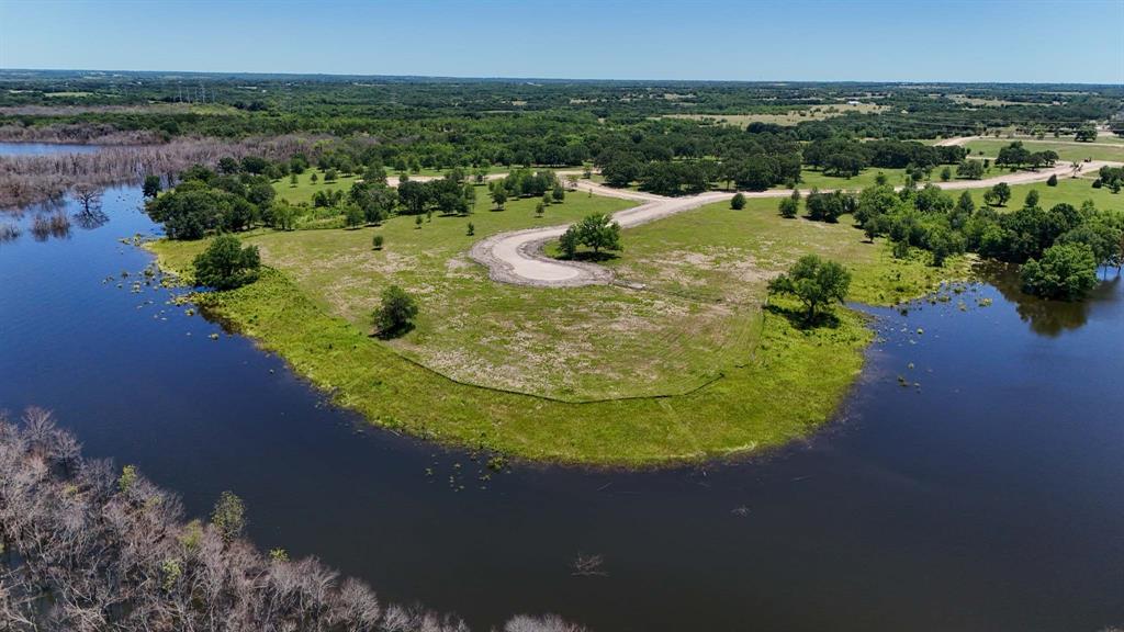 225 Diamond Point Dodd City, TX 75438 - Photo 12 of 13 a view of a lake in middle of the town