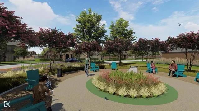 a view of a swimming pool with a slide and a table and chairs