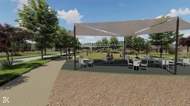 a view of a park with sitting area