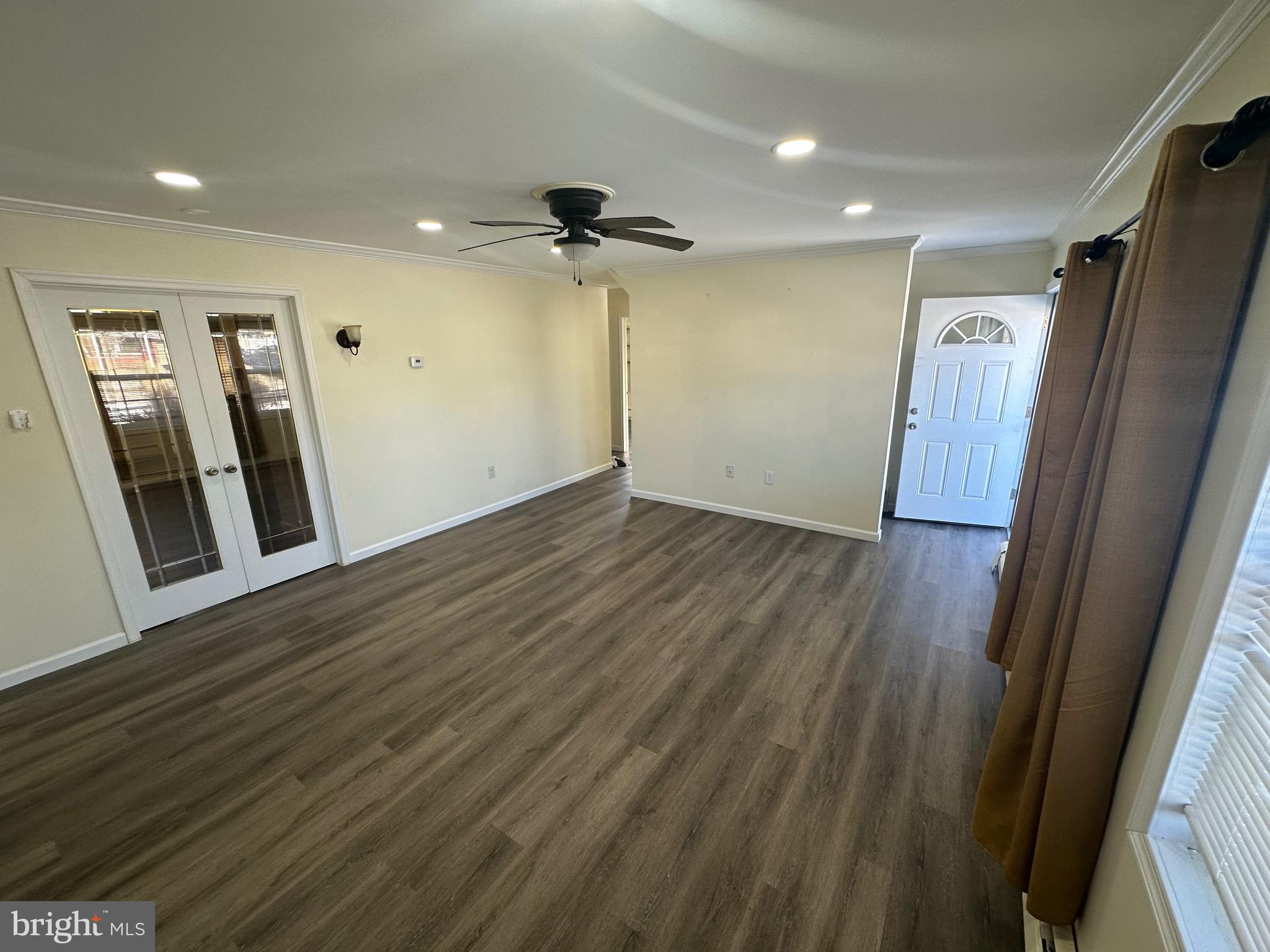 18 Victoria Lane Levittown, PA 19054 - Photo 5 of 19 a view of empty room with wooden floor