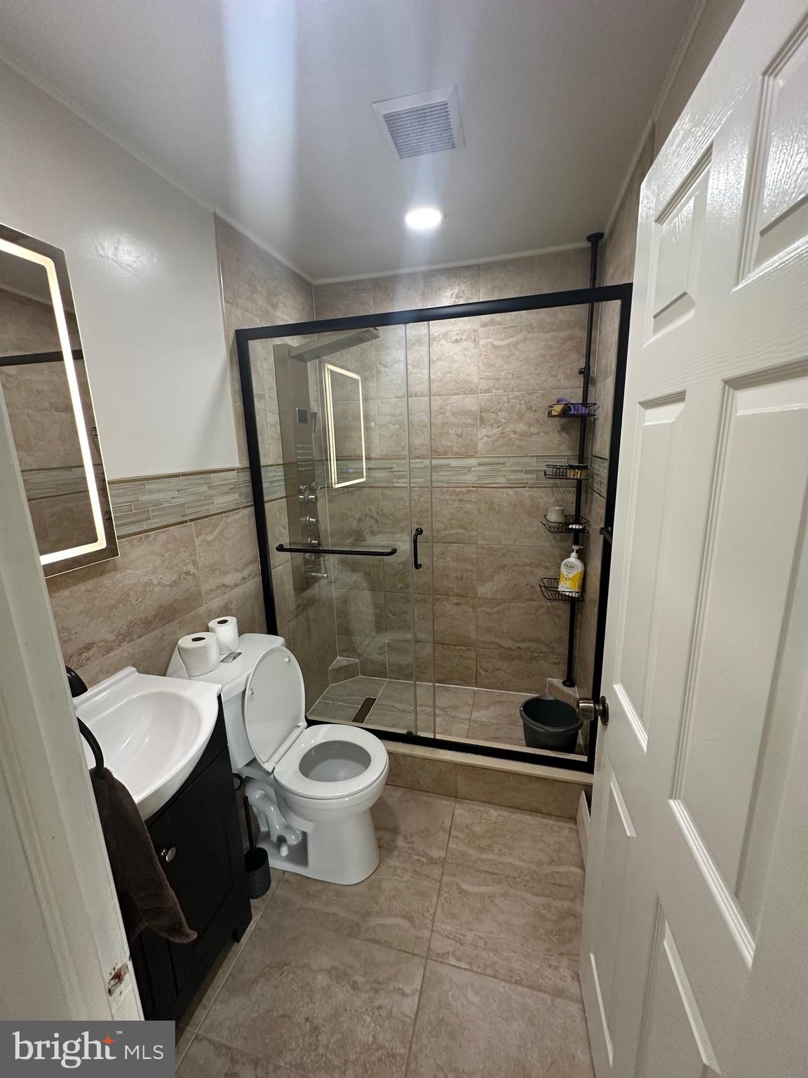 18 Victoria Lane Levittown, PA 19054 - Photo 7 of 19 a bathroom with a toilet and a shower