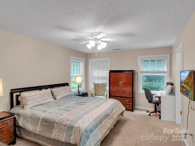 a workspace with furniture and window