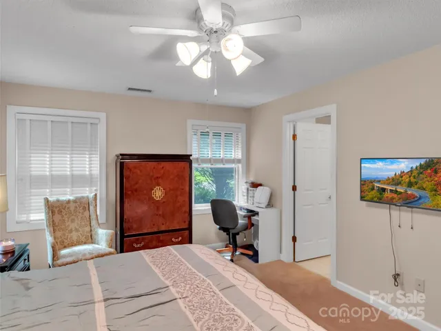 a bathroom with double vanity sinks a vanity and a mirror