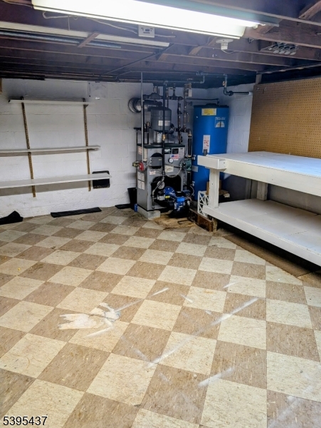 15 Friar Road Morris Plains, NJ 07950 - Photo 13 of 18 a view of a room with gym equipment