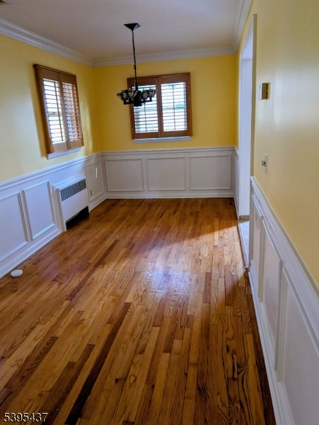 15 Friar Road Morris Plains, NJ 07950 - Photo 5 of 18 a view of a room with wooden floor and staircase