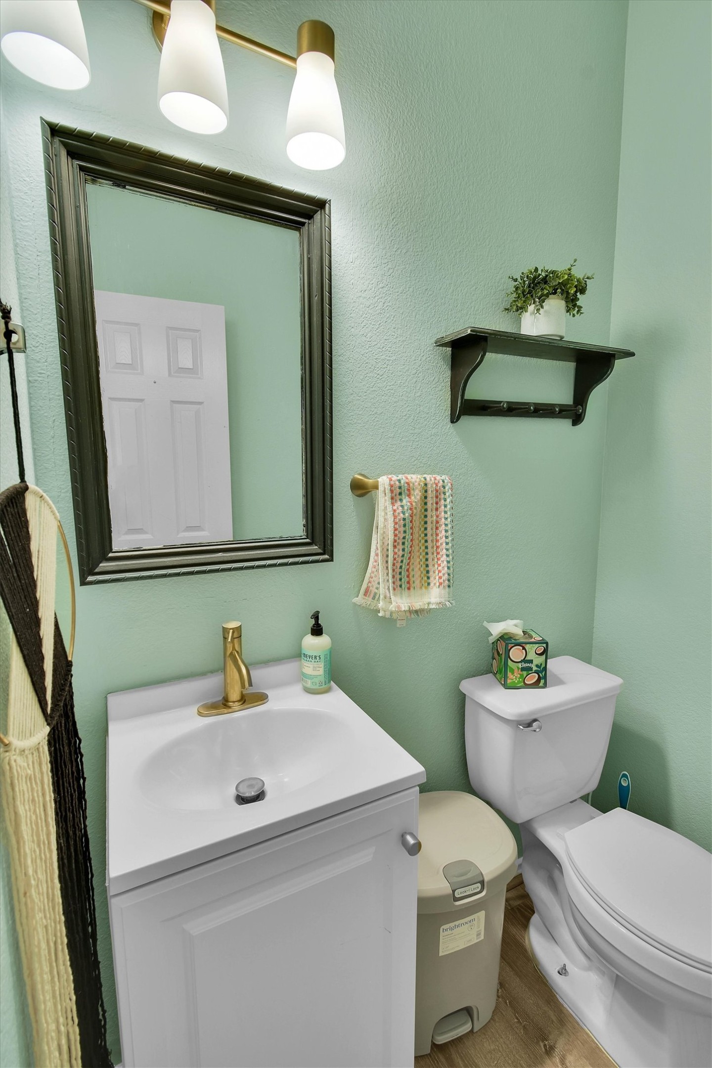 92 Verde Ranch Loop Leander, TX 78641 - Photo 8 of 37 a bathroom with a toilet sink and mirror