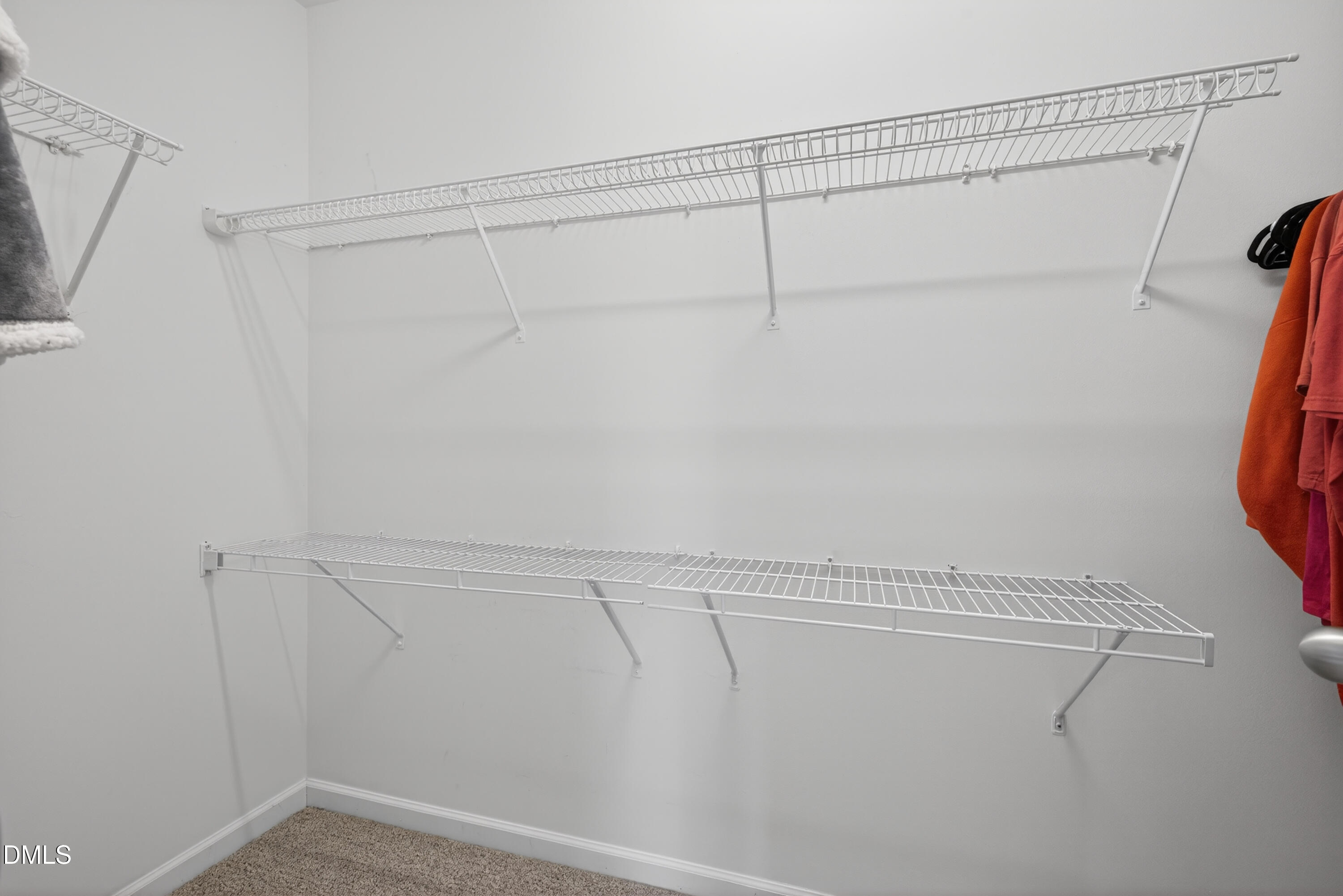 8498 Central Drive Raleigh, NC 27613 - Photo 36 of 54 Walk in Closet in Primary Bedroom Suite