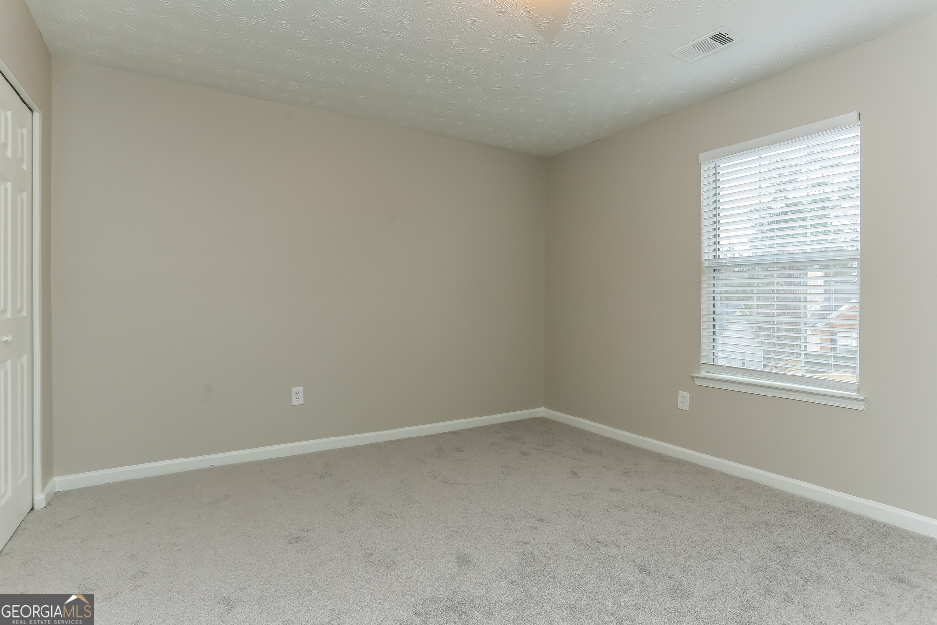 3797 Landgraf Cove Decatur, GA 30034 - Photo 11 of 17 an empty room with a window