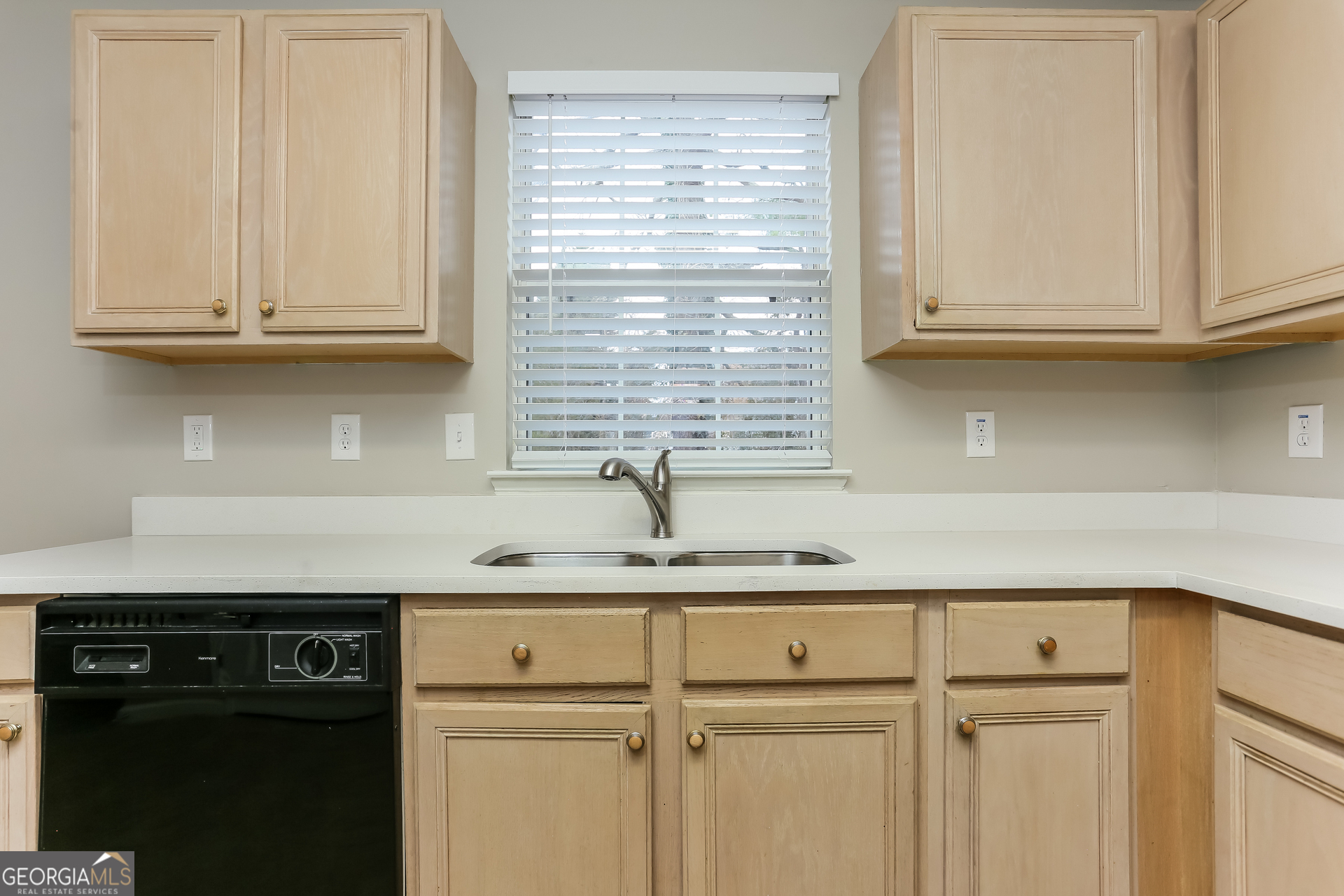 3797 Landgraf Cove Decatur, GA 30034 - Photo 6 of 17 a kitchen with granite countertop white cabinets and a white stove