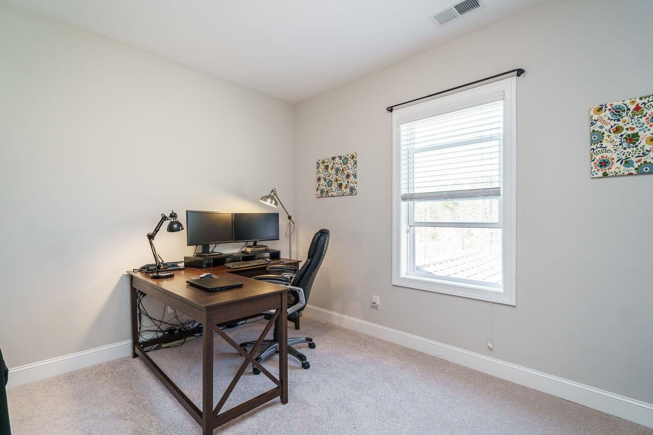 1509 Yakimas Road Raleigh, NC 27603 - Photo 23 of 38 This home has a flex space that also has a closet so it's perfect for a home office, library or whatever your needs may be. Office
