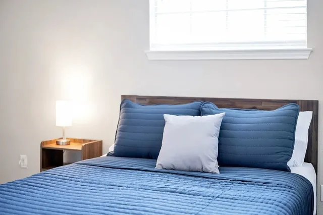 a room with wooden floor and chair