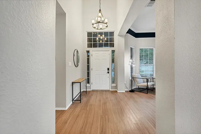 a view of livingroom with hardwood floor and a window