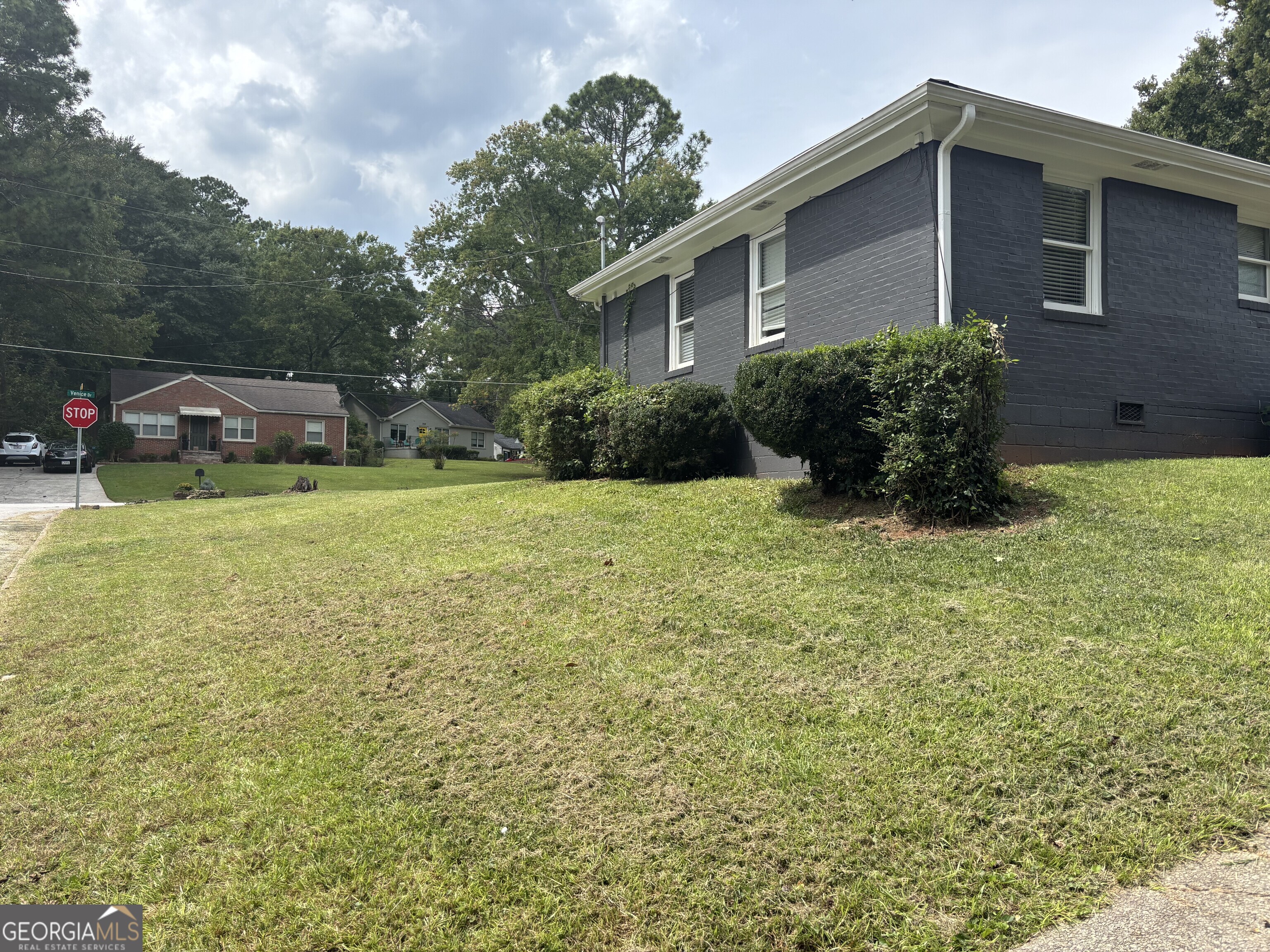 1622 Venice Drive Southeast Decatur, GA 30032 - Photo 2 of 2 a view of a house with a yard and sitting area