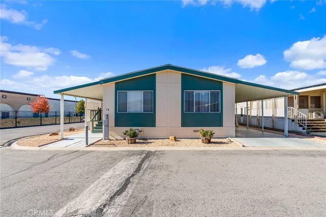 a view of a house with outdoor space and patio