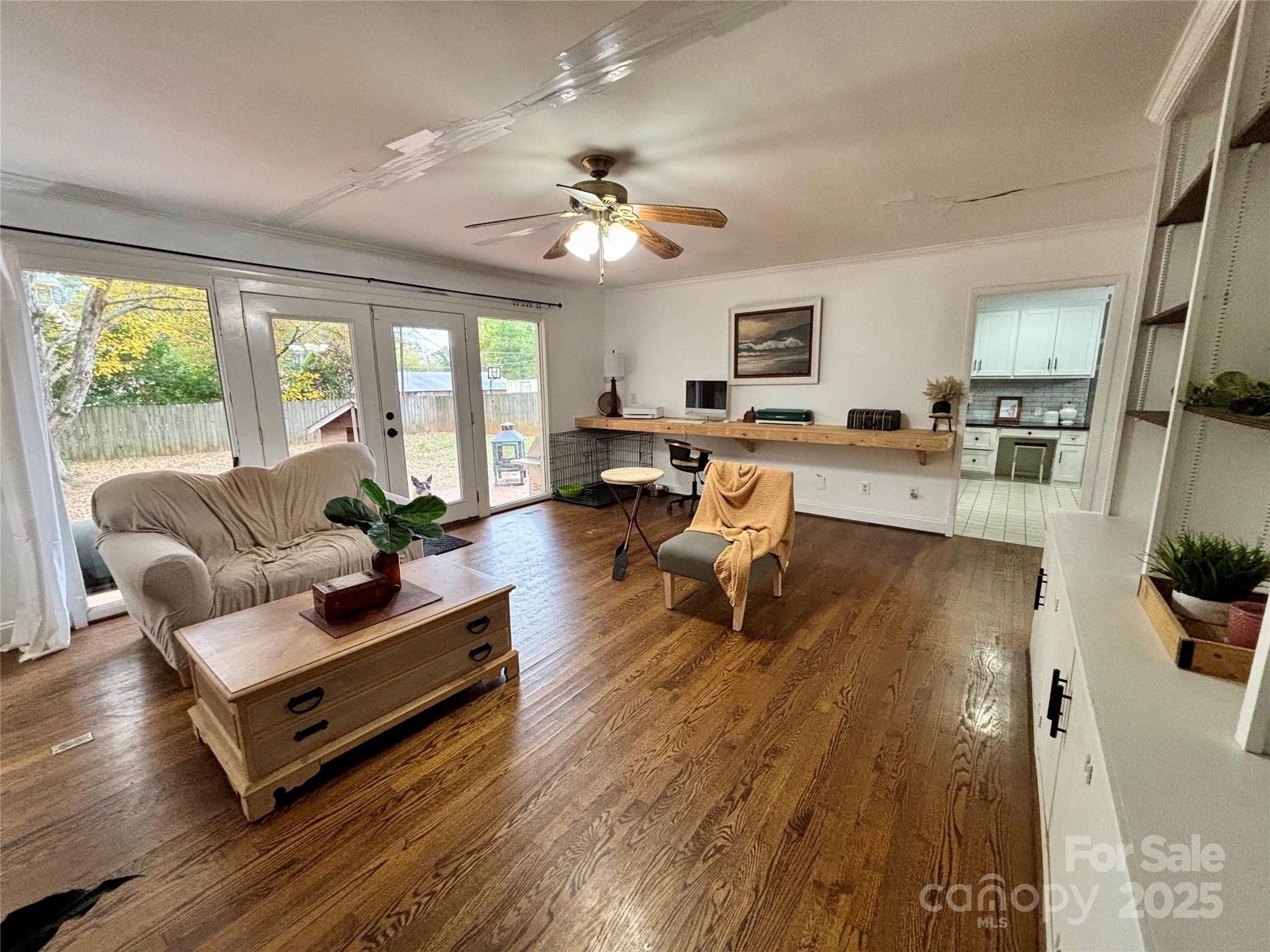 707 West Barr Street Lancaster, SC 29720 - Photo 30 of 43 a living room with furniture and a flat screen tv