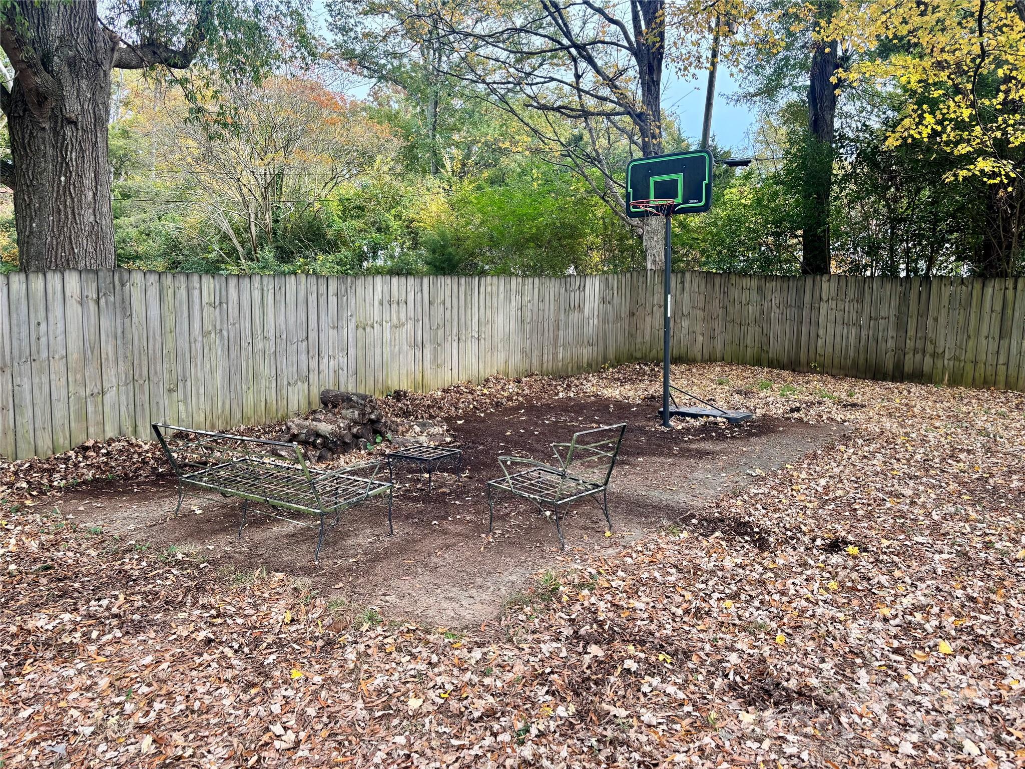 707 West Barr Street Lancaster, SC 29720 - Photo 42 of 43 a view of a chairs and yard in the back yard