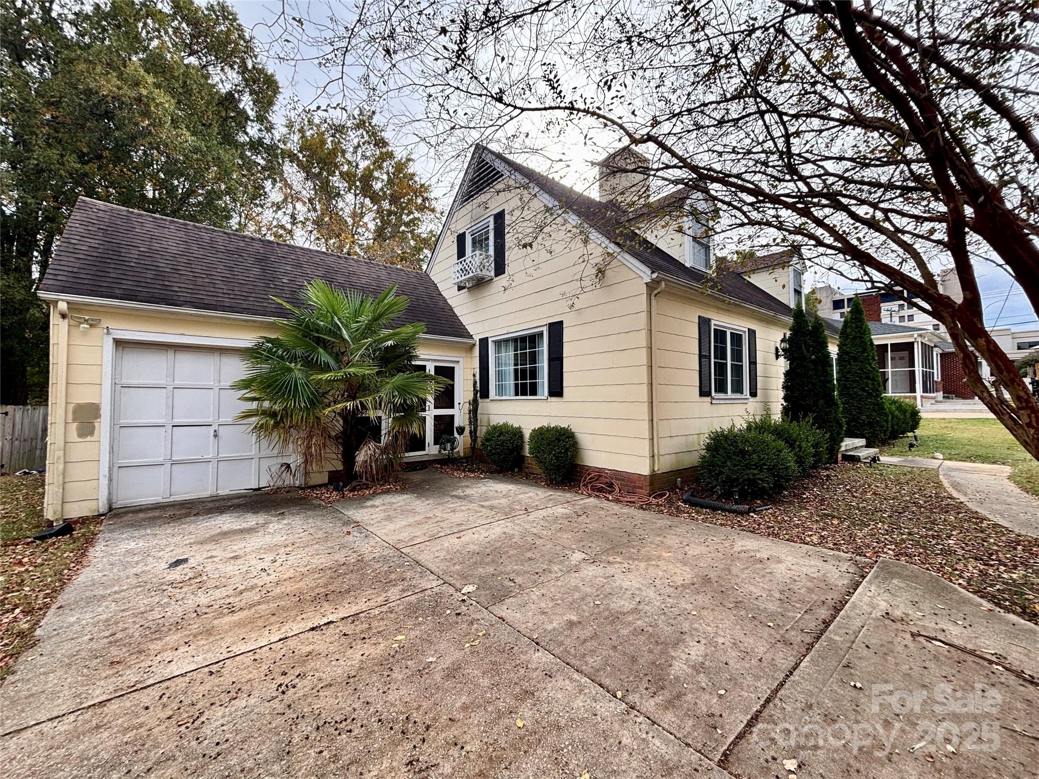707 West Barr Street Lancaster, SC 29720 - Photo 5 of 43 a front view of a house with a yard and garage