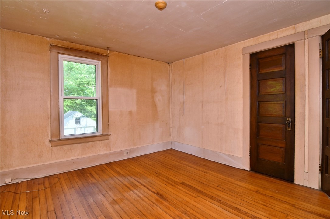 272 Miles Road Chagrin Falls, OH 44022 - Photo 20 of 22 Spare room featuring hardwood / wood-style flooring and baseboards