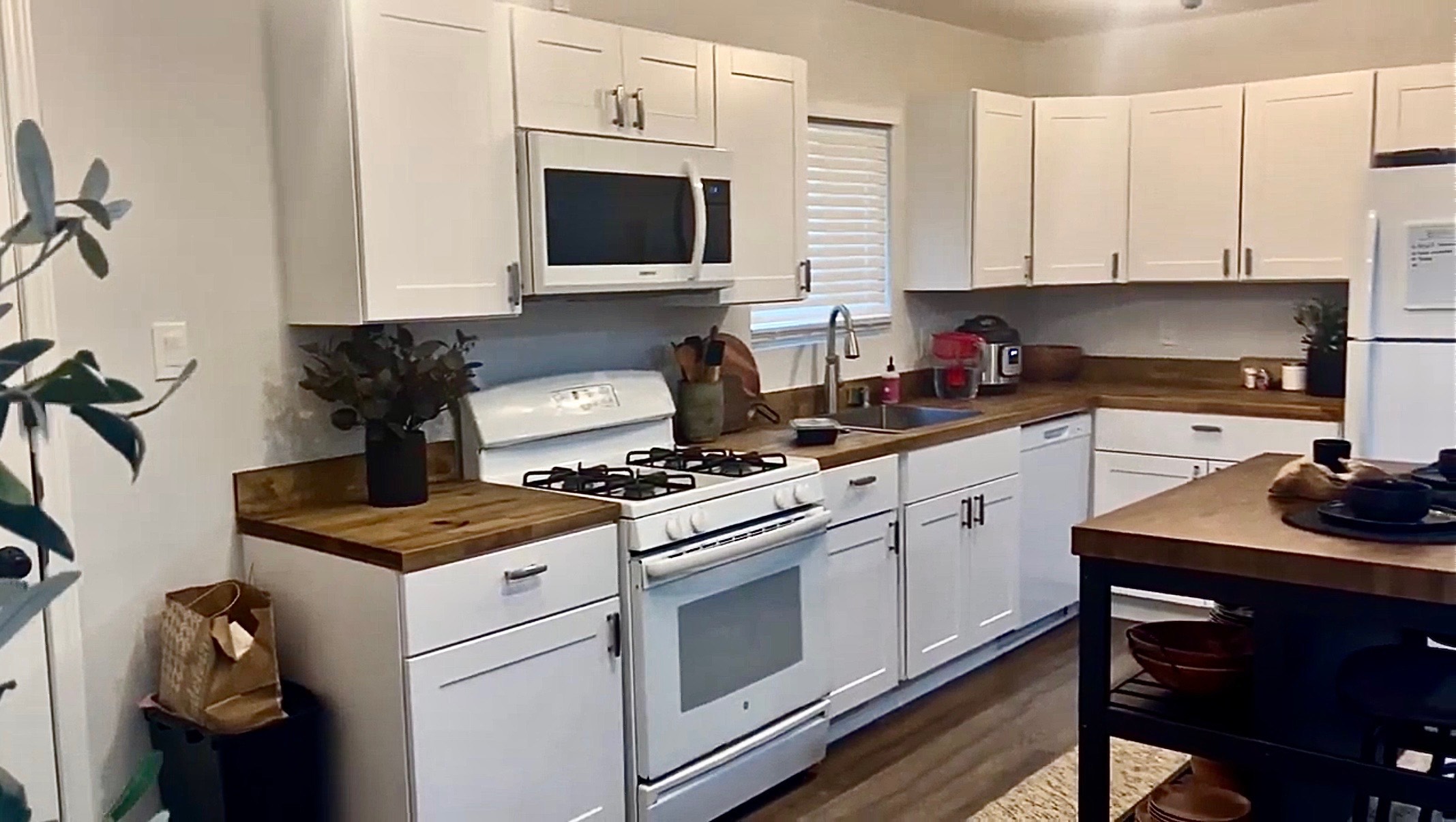 3109 Plantation Road, Unit B Austin, TX 78745 - Photo 3 of 8 a kitchen with cabinets appliances and a counter space