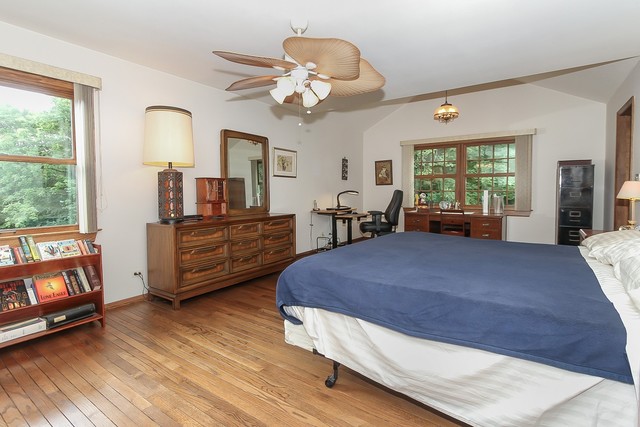 42W930 McDonald Road Elgin, IL 60124 - Photo 13 of 20 a bed room with a bed mirror and a window