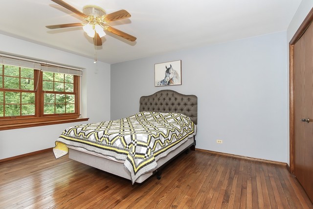 42W930 McDonald Road Elgin, IL 60124 - Photo 15 of 20 a bedroom with a bed and a window
