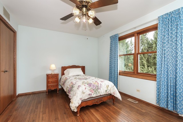 42W930 McDonald Road Elgin, IL 60124 - Photo 16 of 20 a bedroom with a bed and a window