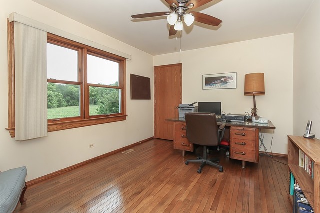 42W930 McDonald Road Elgin, IL 60124 - Photo 18 of 20 a workspace with furniture hardwood and a window