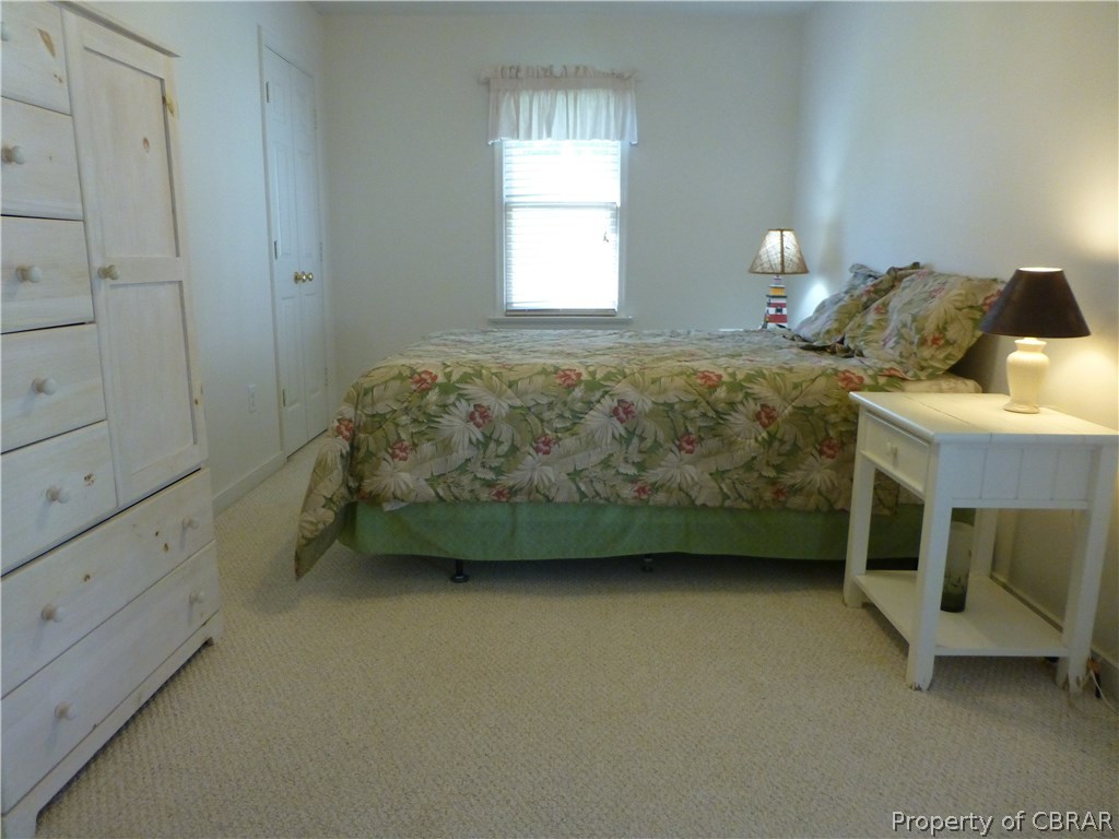 464 Jackson Creek Road Deltaville, VA 23043 - Photo 13 of 26 Master Bedroom with access to side porch