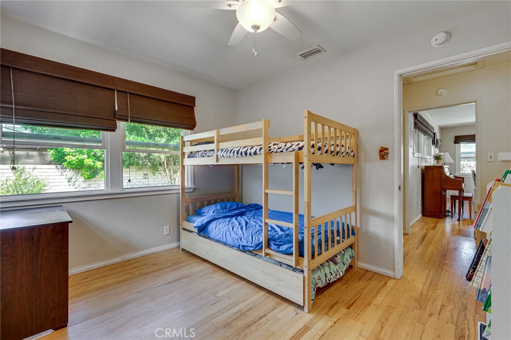 3513 Gondar Avenue Long Beach, CA 90808 - Photo 19 of 30 a bedroom with furniture and a window