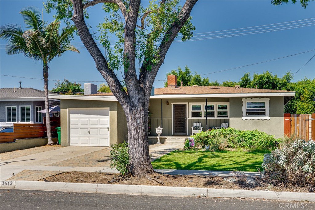 3513 Gondar Avenue Long Beach, CA 90808 - Photo 3 of 30 a front view of a house with garden