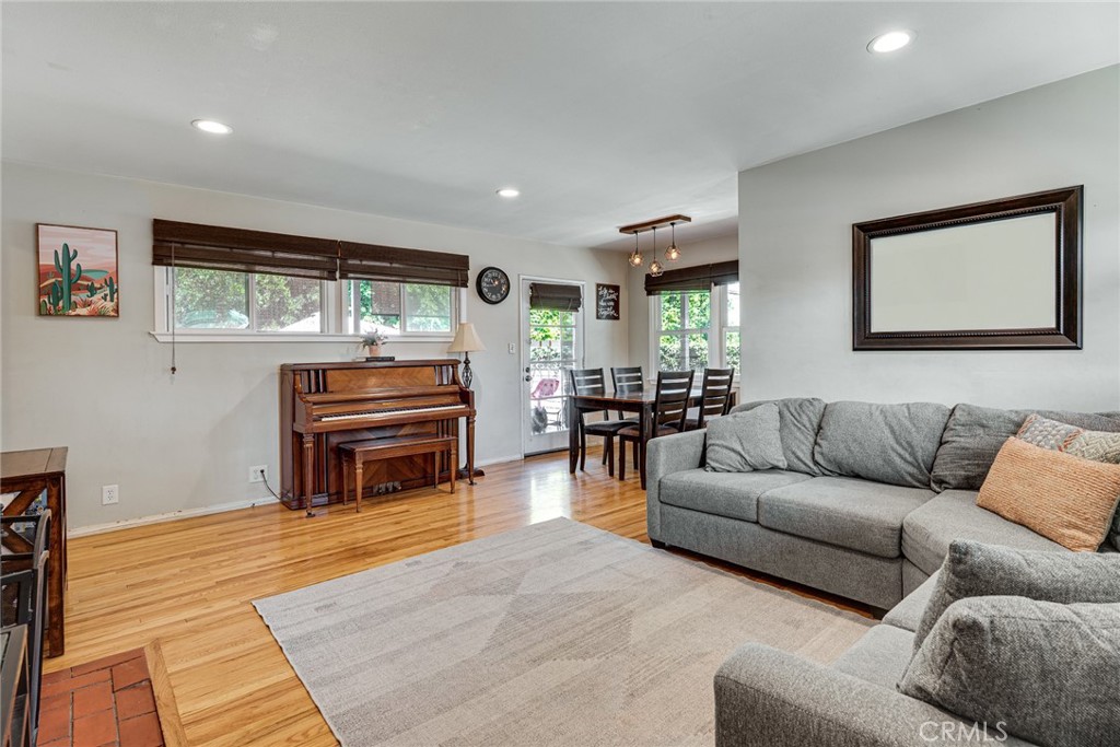 3513 Gondar Avenue Long Beach, CA 90808 - Photo 5 of 30 a living room with furniture and a flat screen tv