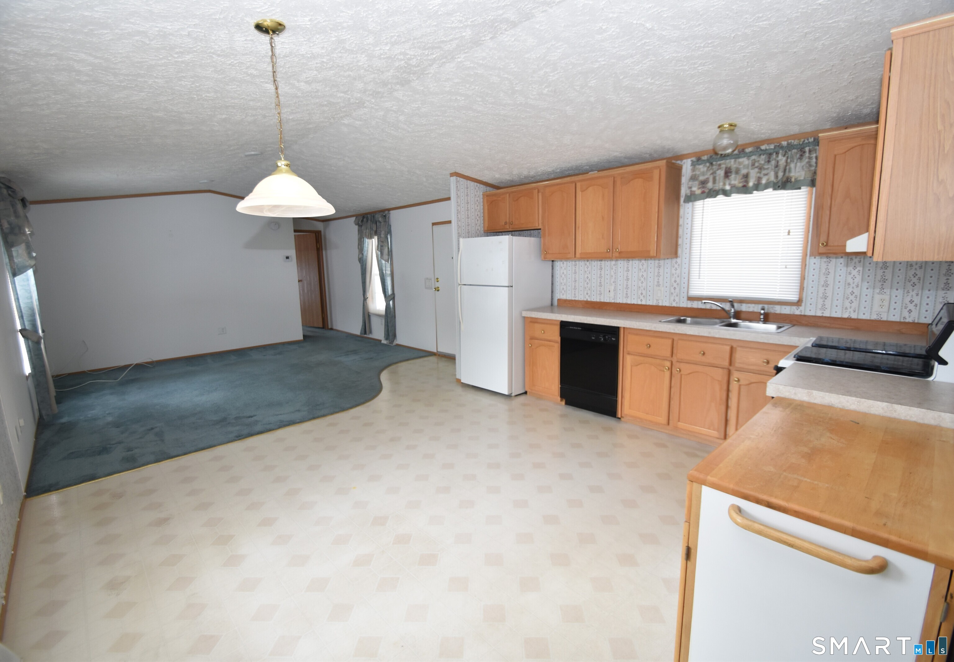 325 Kelly Road Vernon, CT 06066 - Photo 4 of 9 Kitchen towards Living Room
