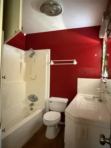 a view of a house with snow on the floor