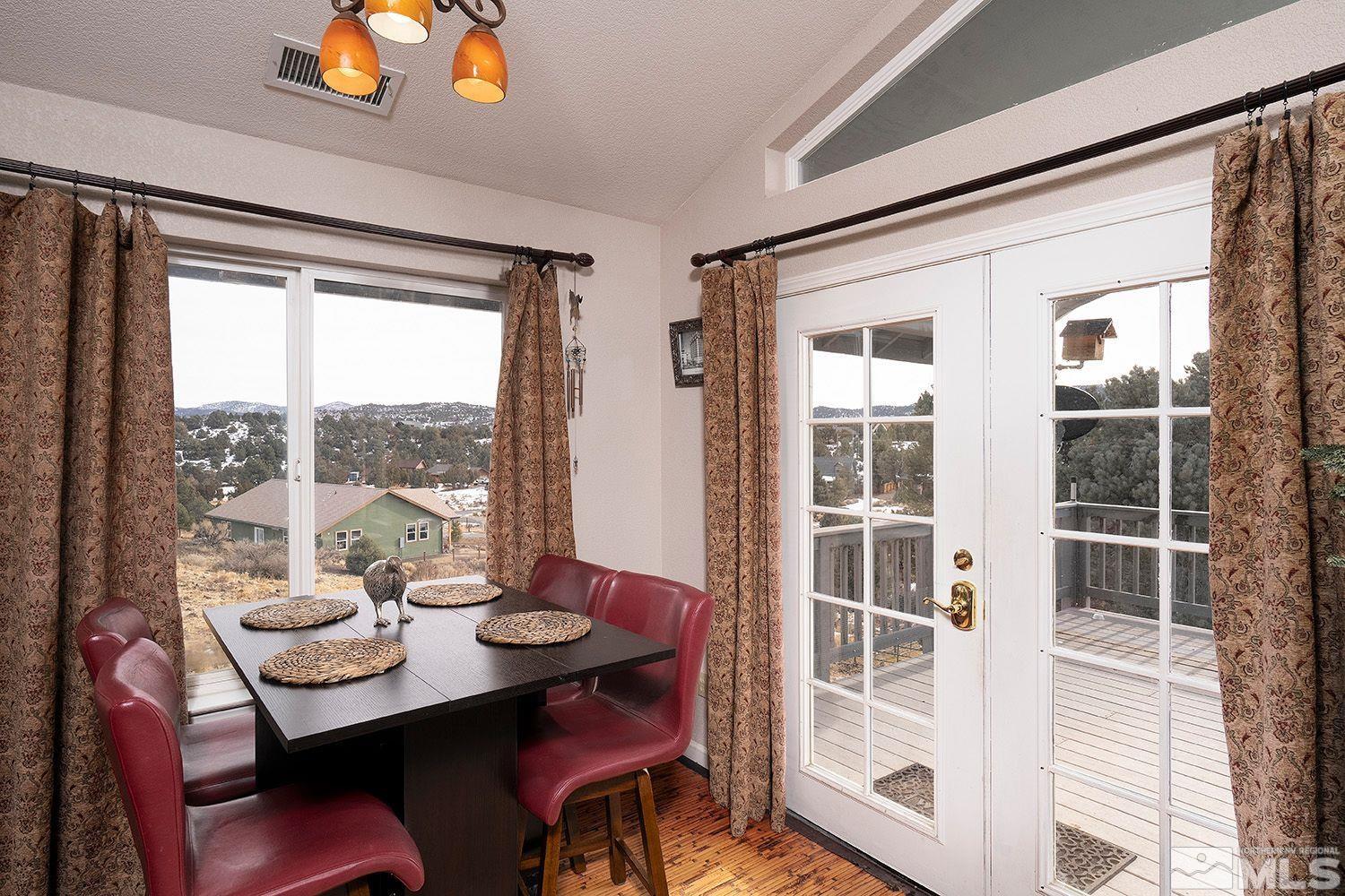 2470 Cartwright Road Reno, NV 89521 - Photo 15 of 29 a view of a dining room with furniture window and outside view