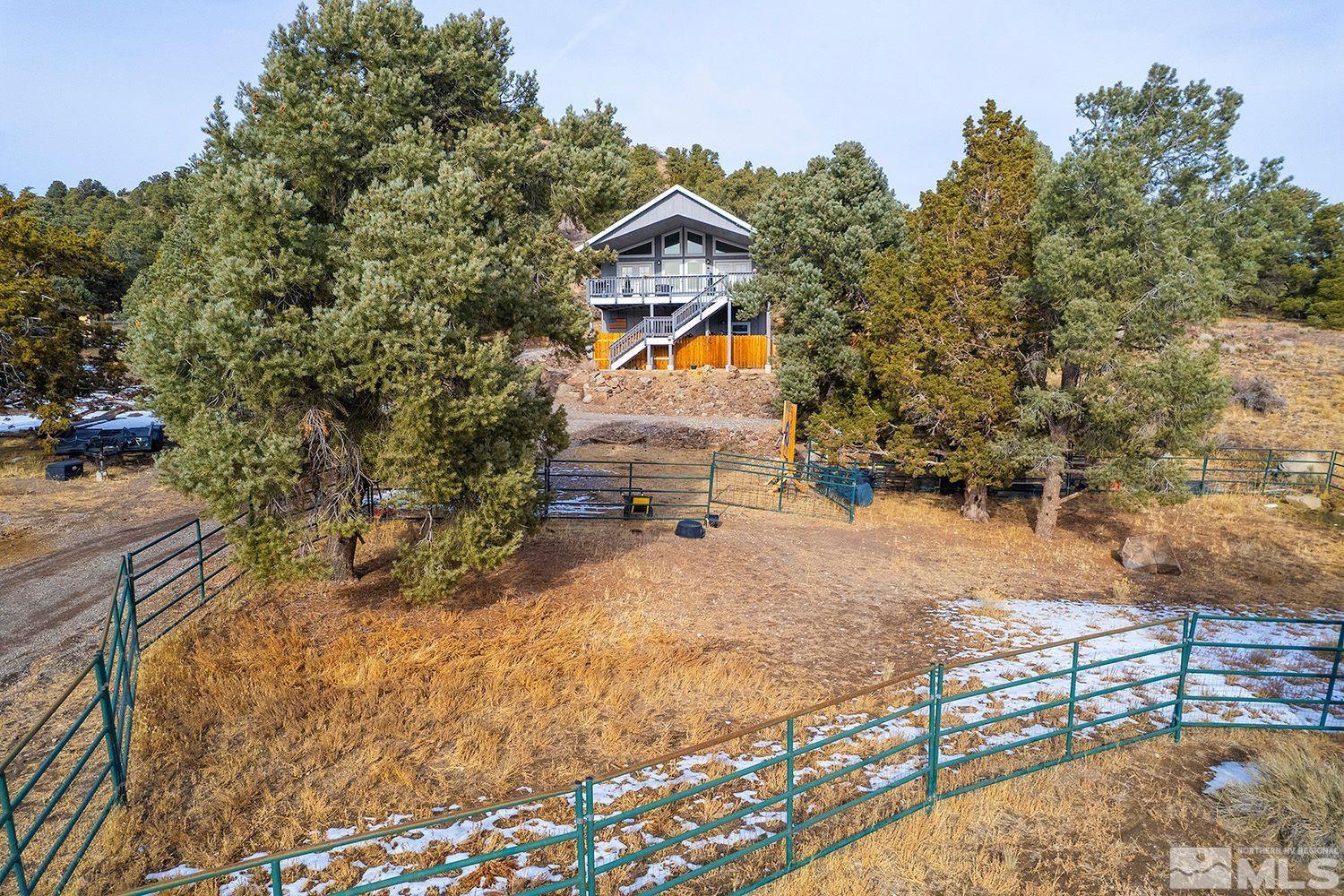 2470 Cartwright Road Reno, NV 89521 - Photo 4 of 29 a front view of a house with a yard