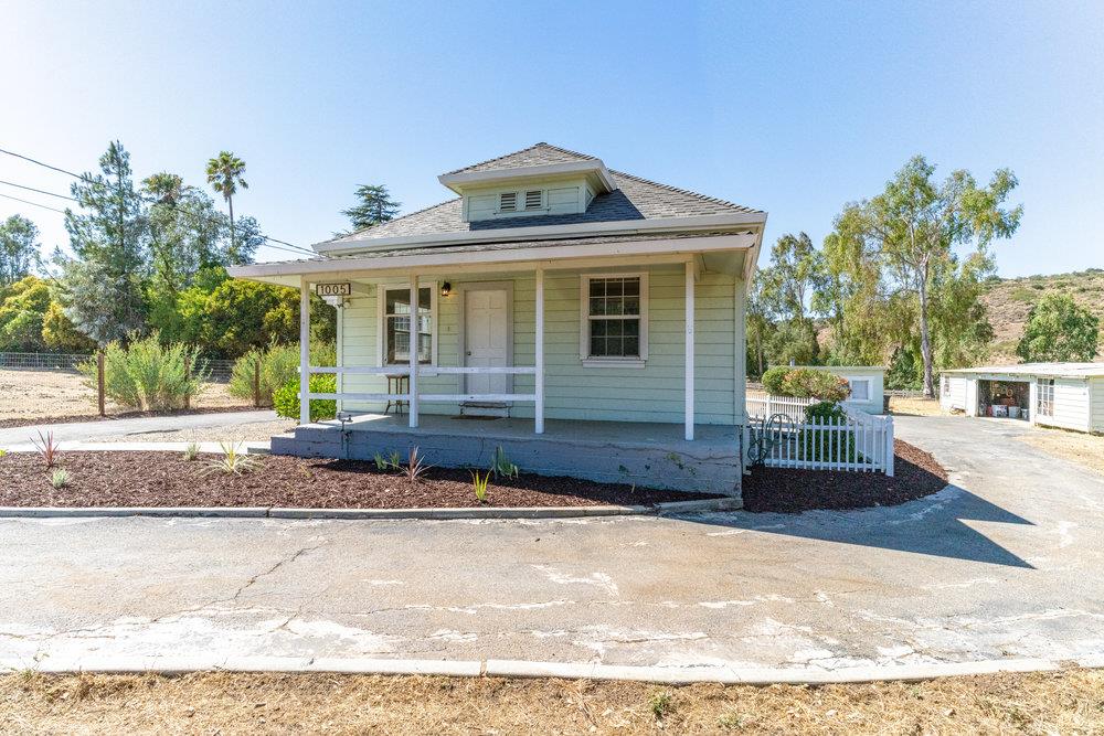 1005 Llagas Road Morgan Hill, CA 95037 - Photo 1 of 1 a front view of a house with a yard
