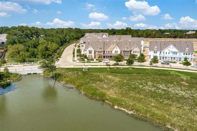 an aerial view of a houses with outdoor space