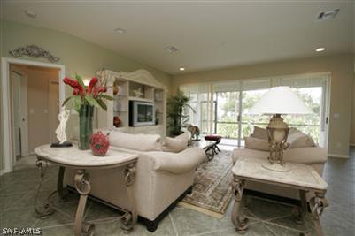 15057 Balmoral Loop Fort Myers, FL 33919 - Photo 2 of 10 a living room with furniture and a potted plant
