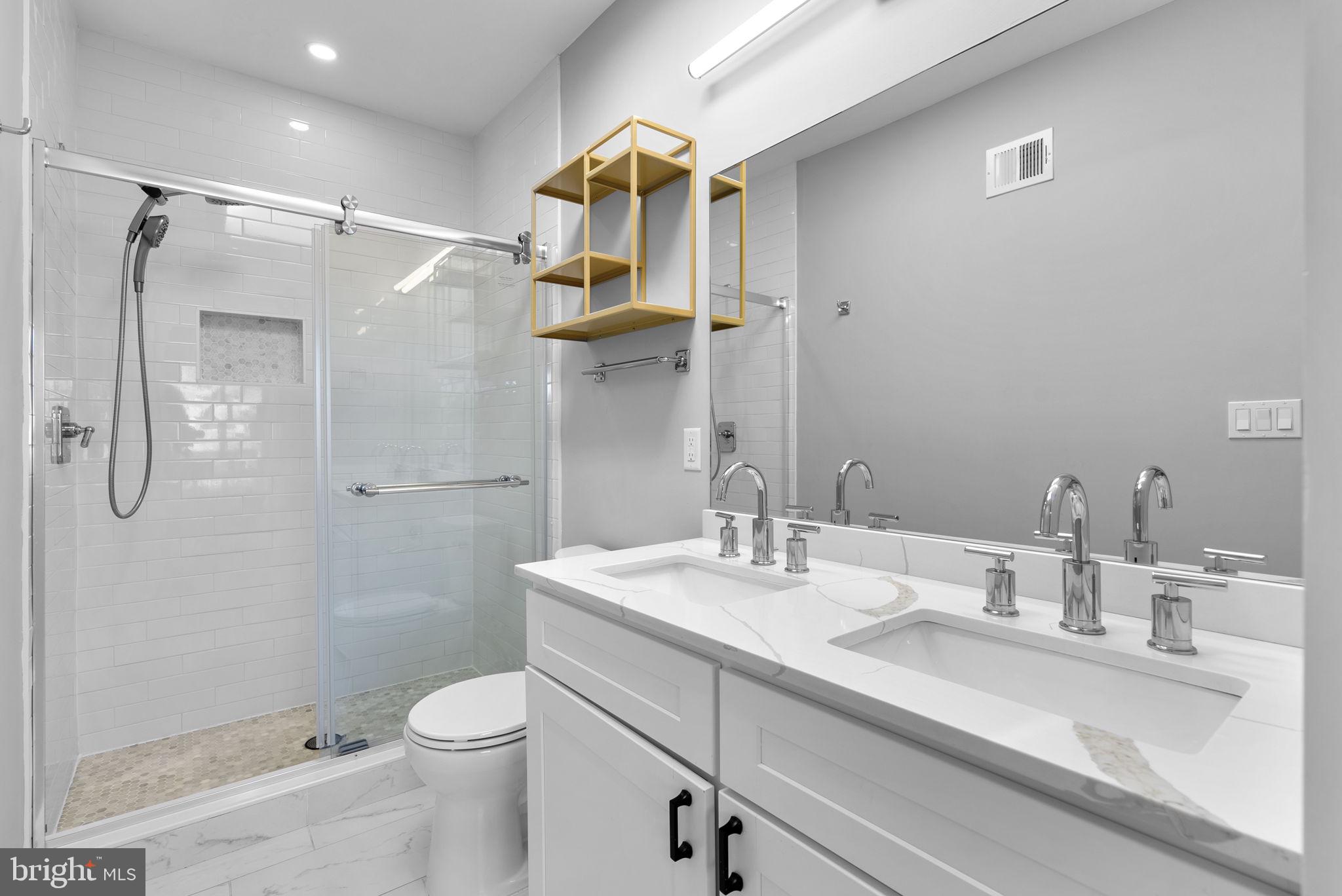 3572 13th Street Northwest, Unit 2 Washington, DC 20010 - Photo 20 of 36 a bathroom with a sink toilet and shower