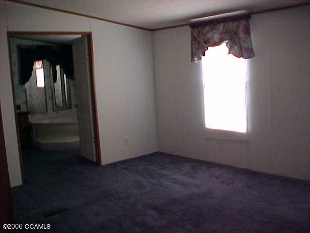 264 Norris Road Swansboro, NC 28584 - Photo 11 of 14 Master bedroom and bath
