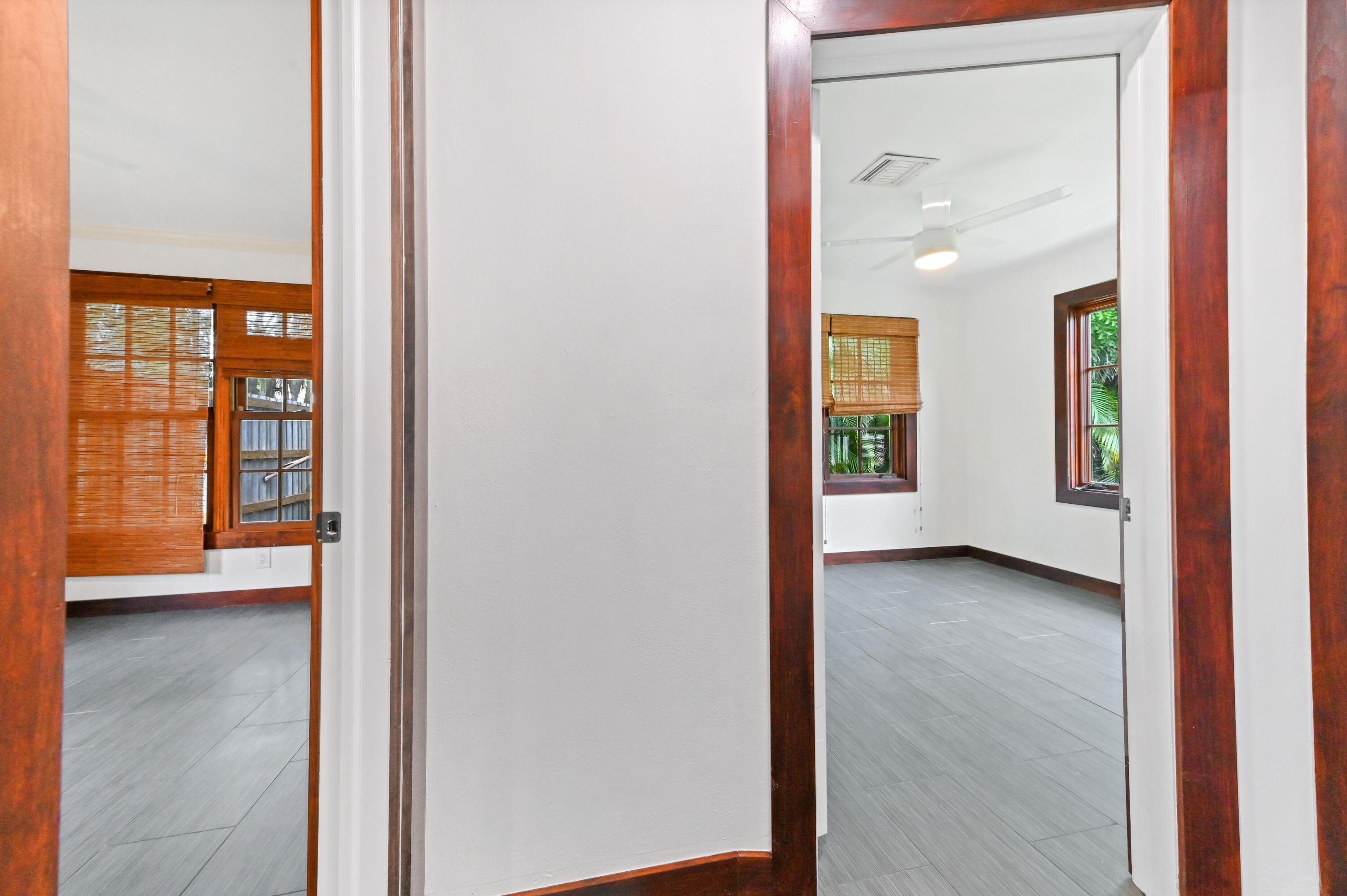 98 Cleveland Road Lake Worth, FL 33467 - Photo 13 of 30 an empty room with windows and closet