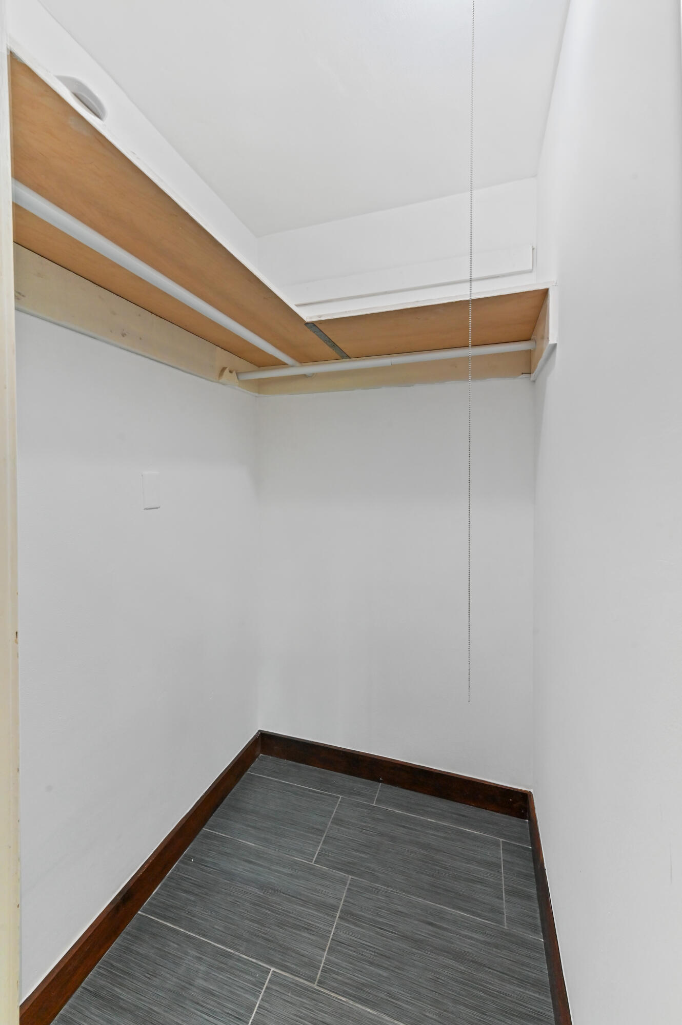 98 Cleveland Road Lake Worth, FL 33467 - Photo 21 of 30 a view of an empty walk in closet